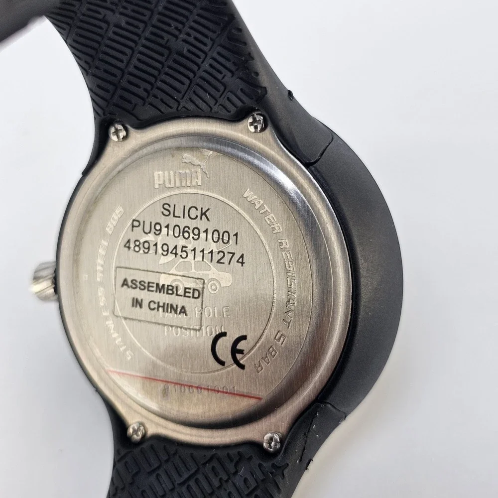 Puma Slick Men's Watch 45MM Black Dial Date Black Plastic Bands New Battery